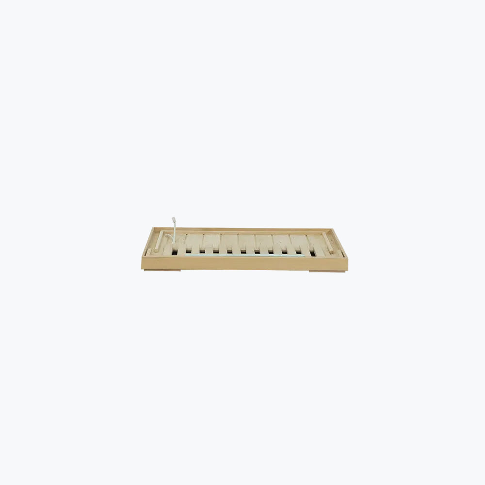 WizziSaunas SH01 Infrared Sauna angled side view of floor panel with carbon heater slats and raised feet