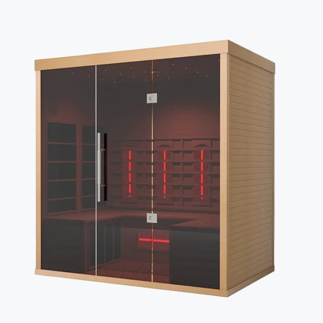 Lumin Three 3-Person Indoor Infrared Sauna angled front view showing cedar wood exterior dark glass doors and glowing red infrared heaters