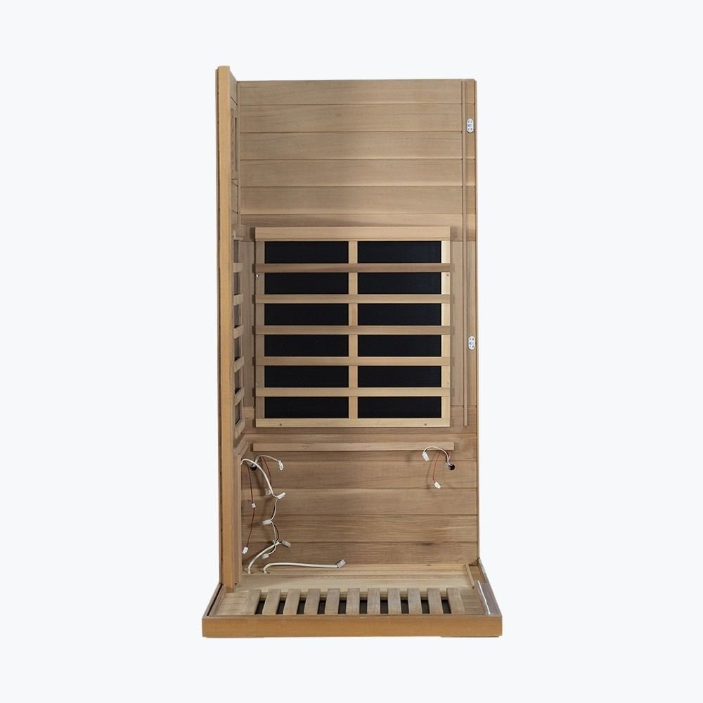 WizziSaunas 909MX Mini red cedar infrared sauna assembly step 3 — floor and additional wall panels installed.