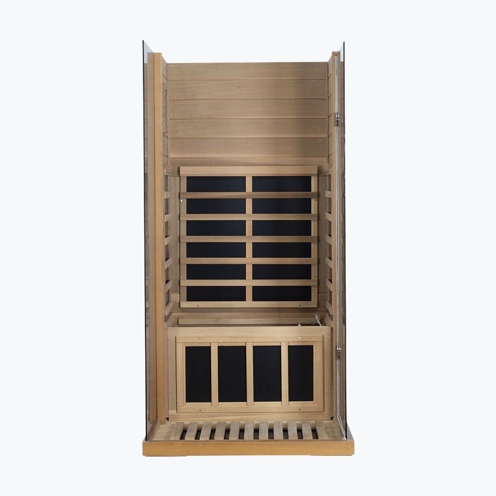 WizziSaunas 909MX Mini red cedar infrared sauna assembly step 6 — floor, walls, and bench installed.
