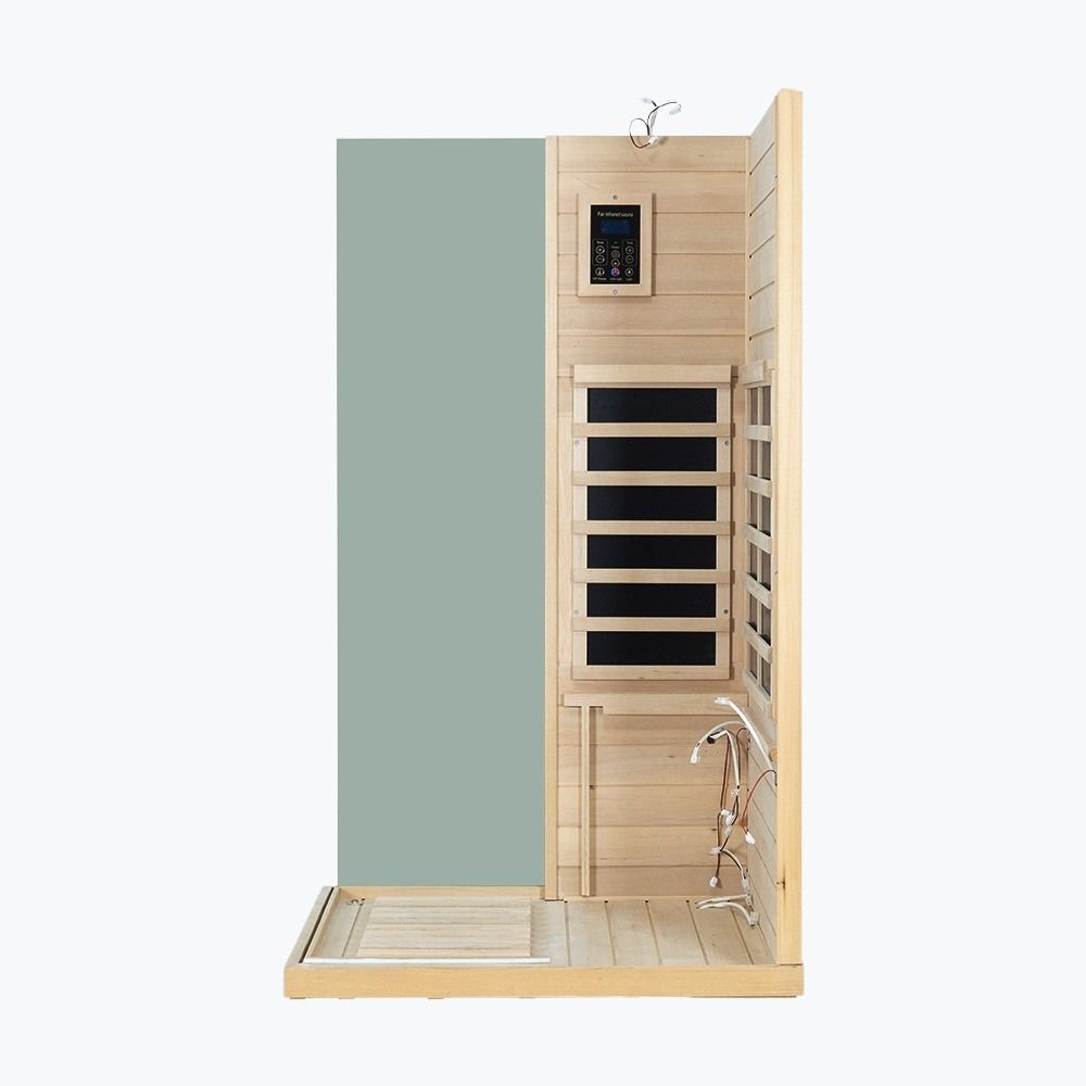 Wooden sauna with a green interior door on a white background