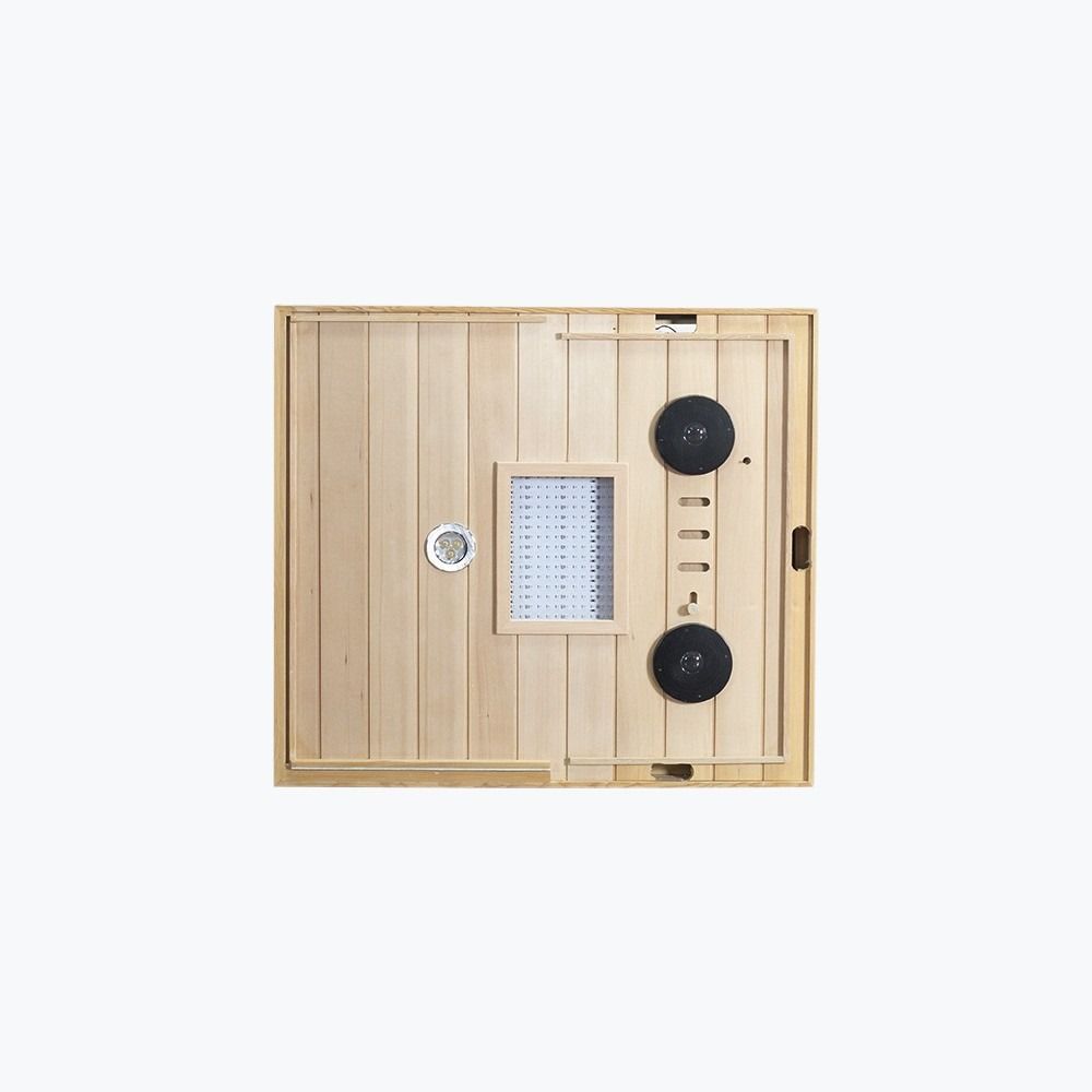 Wooden sauna door with control panel on a white background