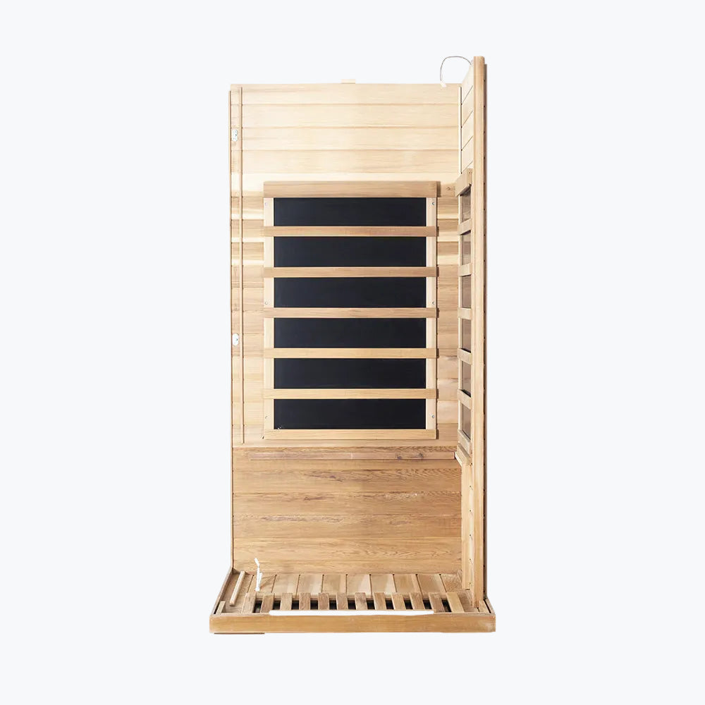WizziSaunas SR01 Red Cedar Infrared Sauna assembly step two showing rear wall and right side wall panels with carbon heaters joined to floor panel on white background