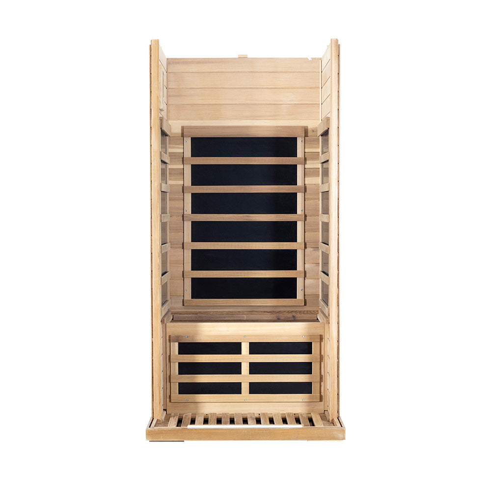 WizziSaunas SR01 Red Cedar Infrared Sauna assembly step four showing three wall panels with bench seat and lower heater panel installed on white background