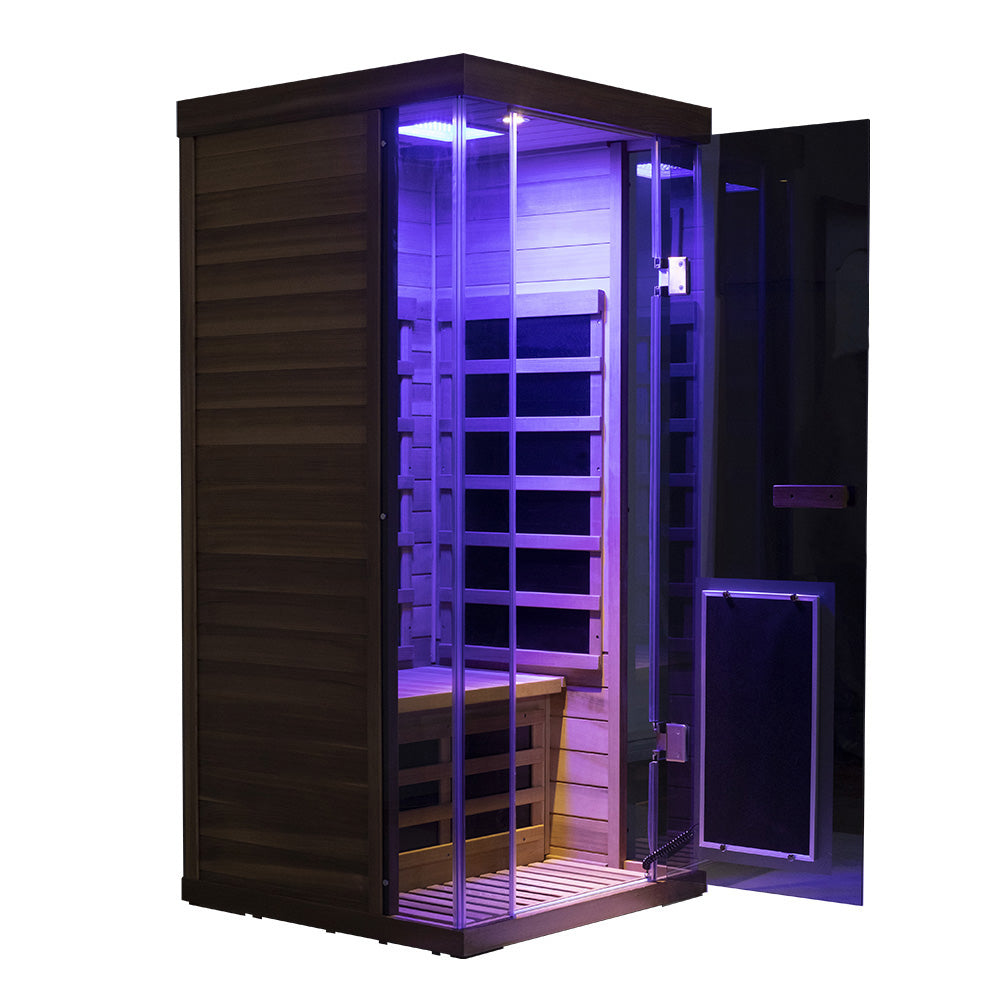 WizziSaunas SR01 Red Cedar Infrared Sauna angled side view with glass door open showing purple chromotherapy interior lighting and carbon heater panels on white background