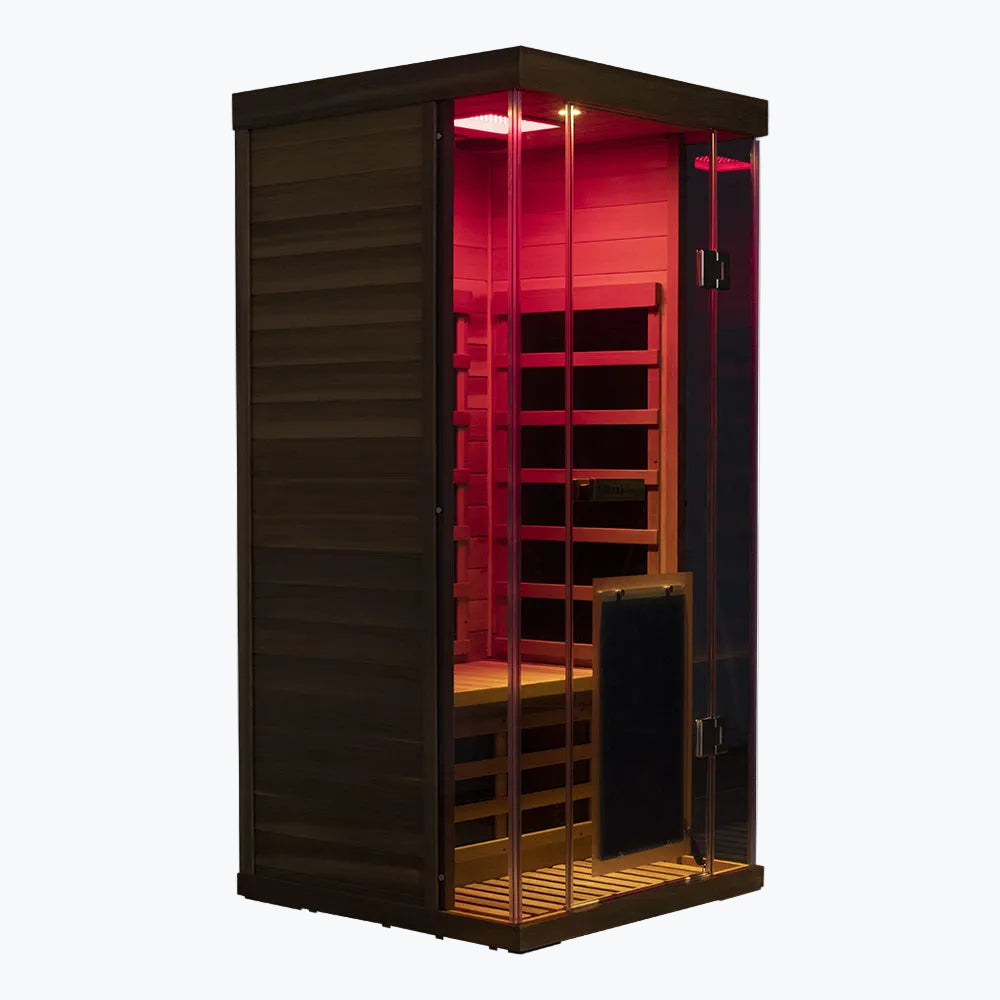 WizziSaunas SR01 Red Cedar 1-Person Full Spectrum Infrared Sauna front view with glass door open showing red chromotherapy lighting and cedar interior on white background