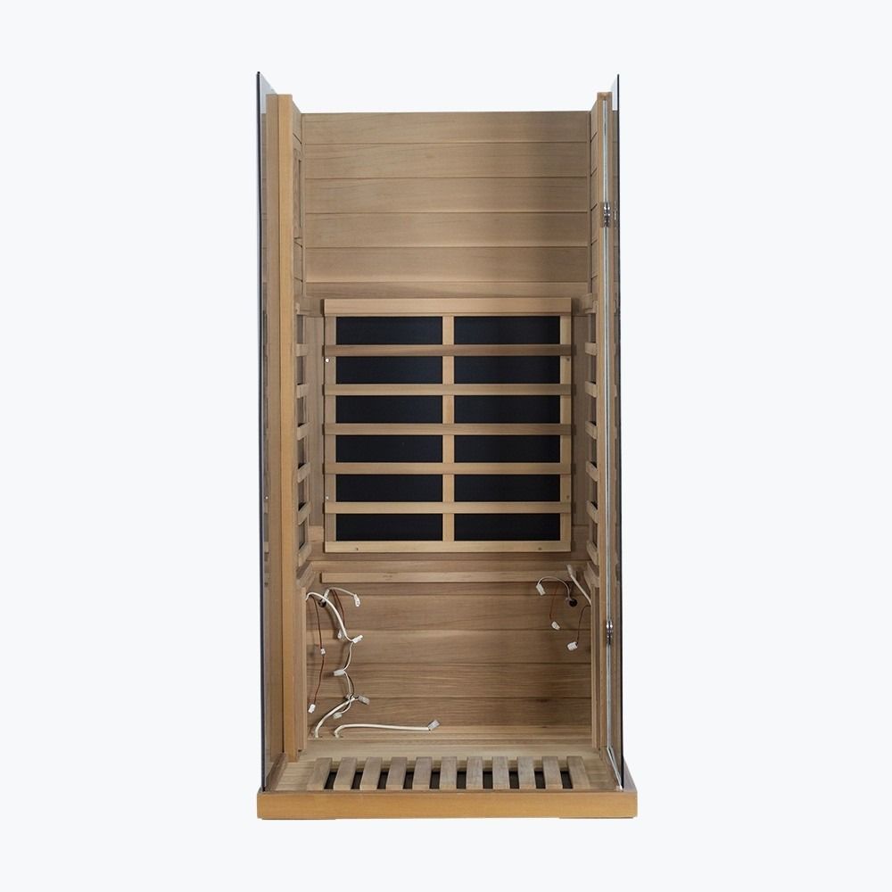 WizziSaunas 909MX Mini red cedar infrared sauna assembly step 5 — floor and three wall panels installed.
