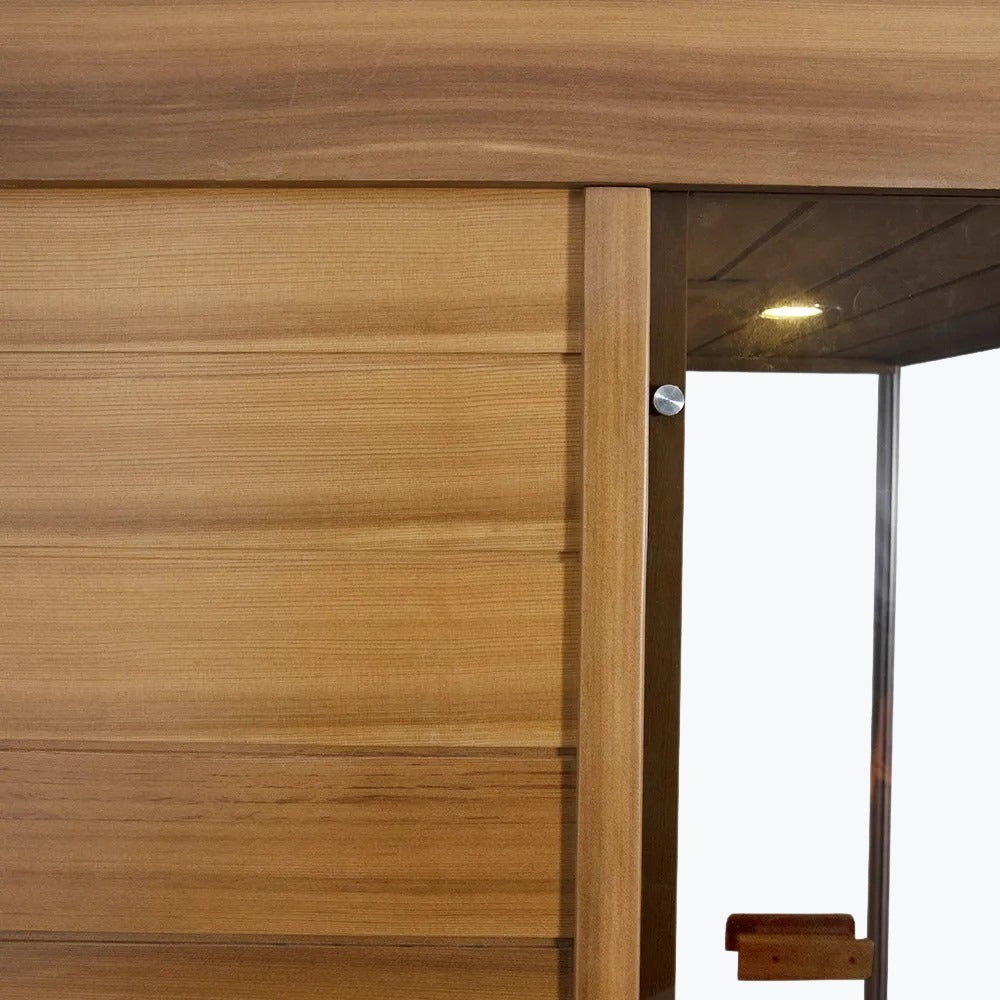 WizziSaunas 909MX Mini red cedar infrared sauna exterior close up of red cedar wood siding.